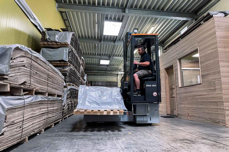 Phoenix multi-directional forklift transports wood