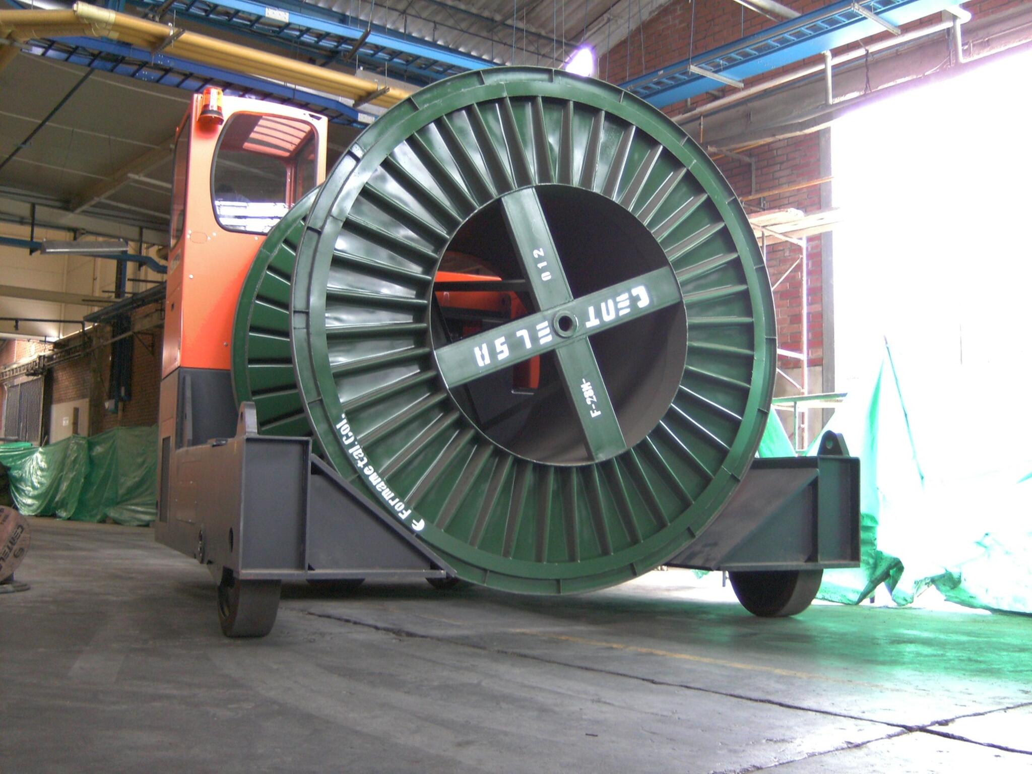 HUBTEX forklift with raised drum.